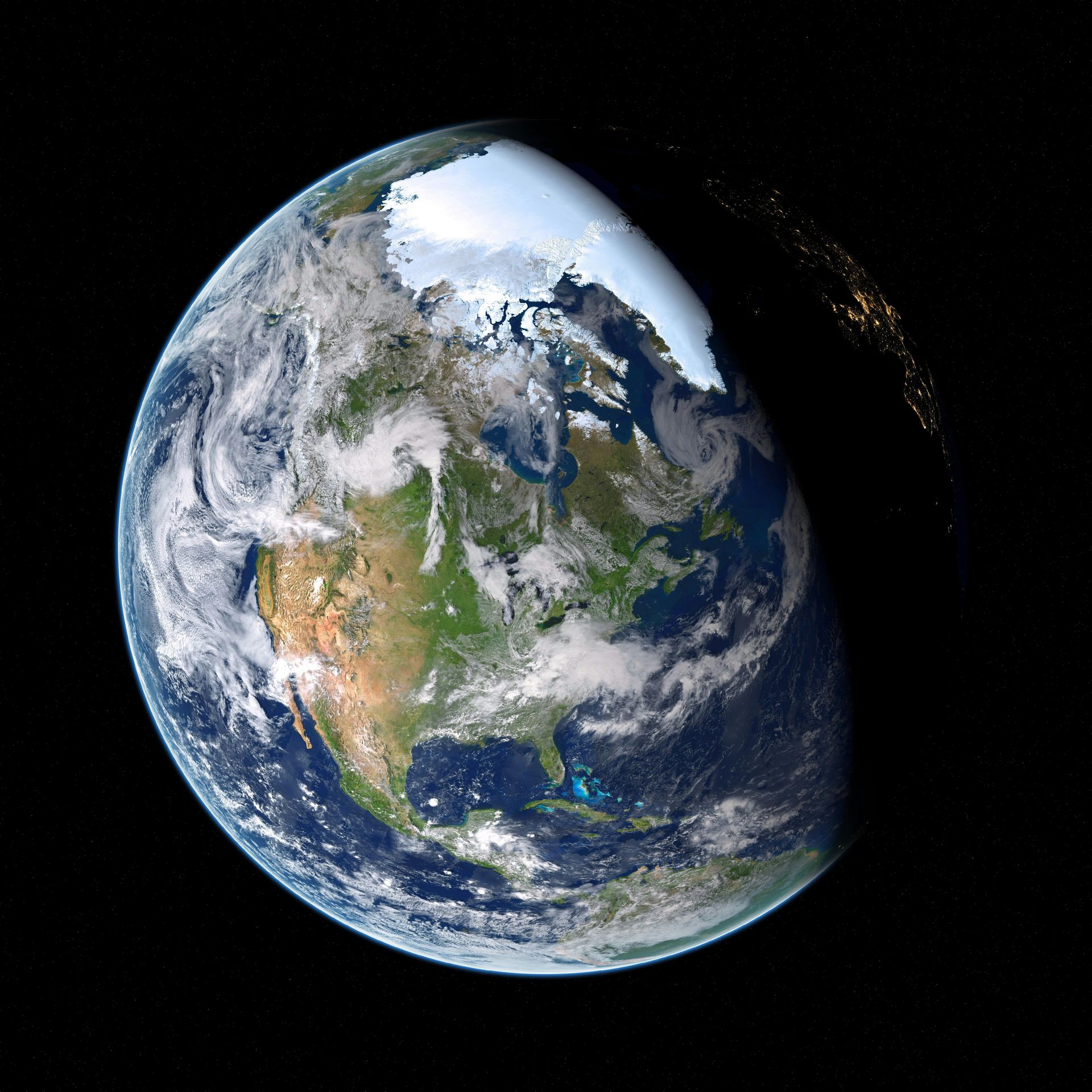 Earth from space showing North America, the Arctic ice cap, and a transition into nighttime on the right.