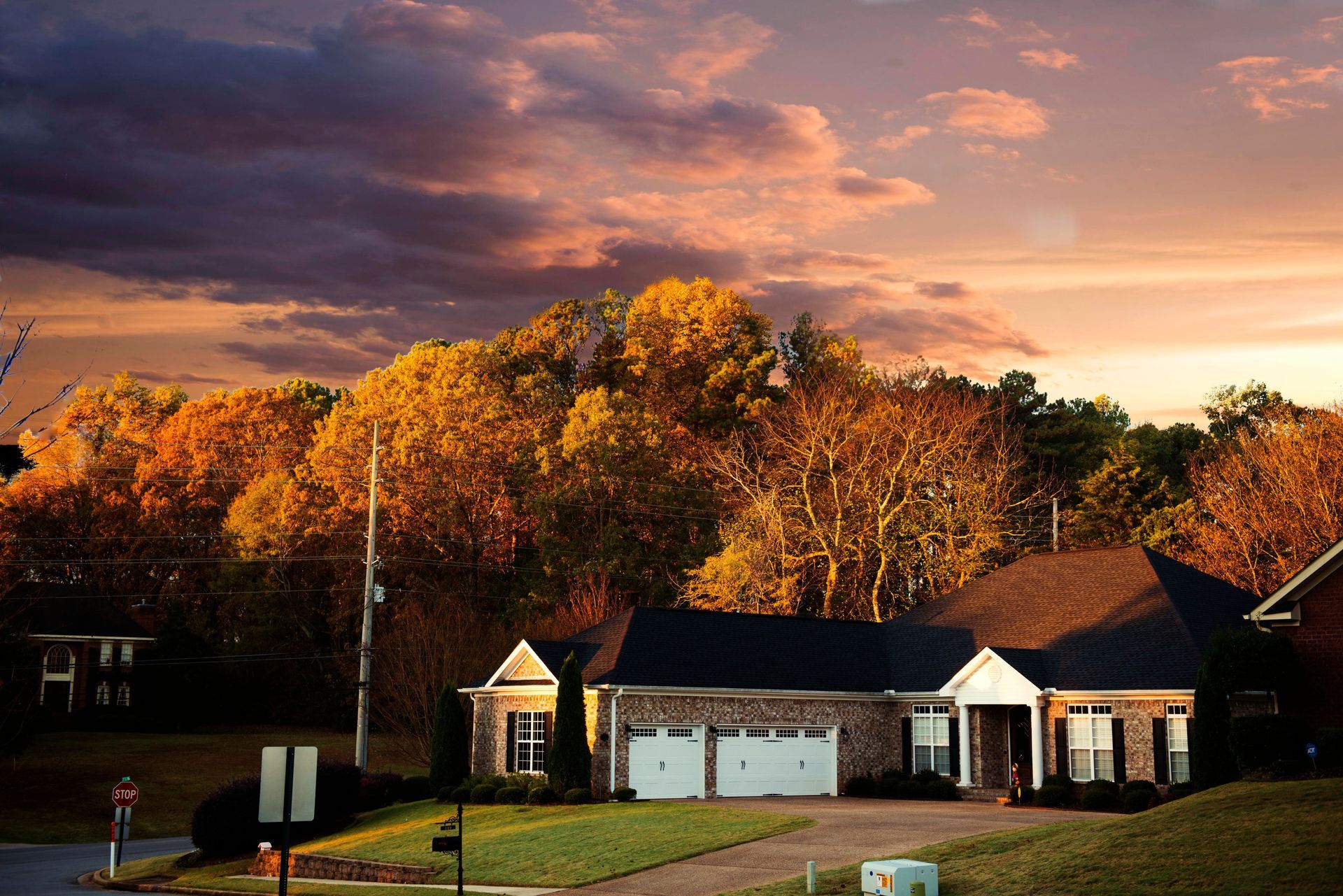 Detached homes on a mature tree-lined street in the Dempsey neighbourhood of Milton, Ontario
