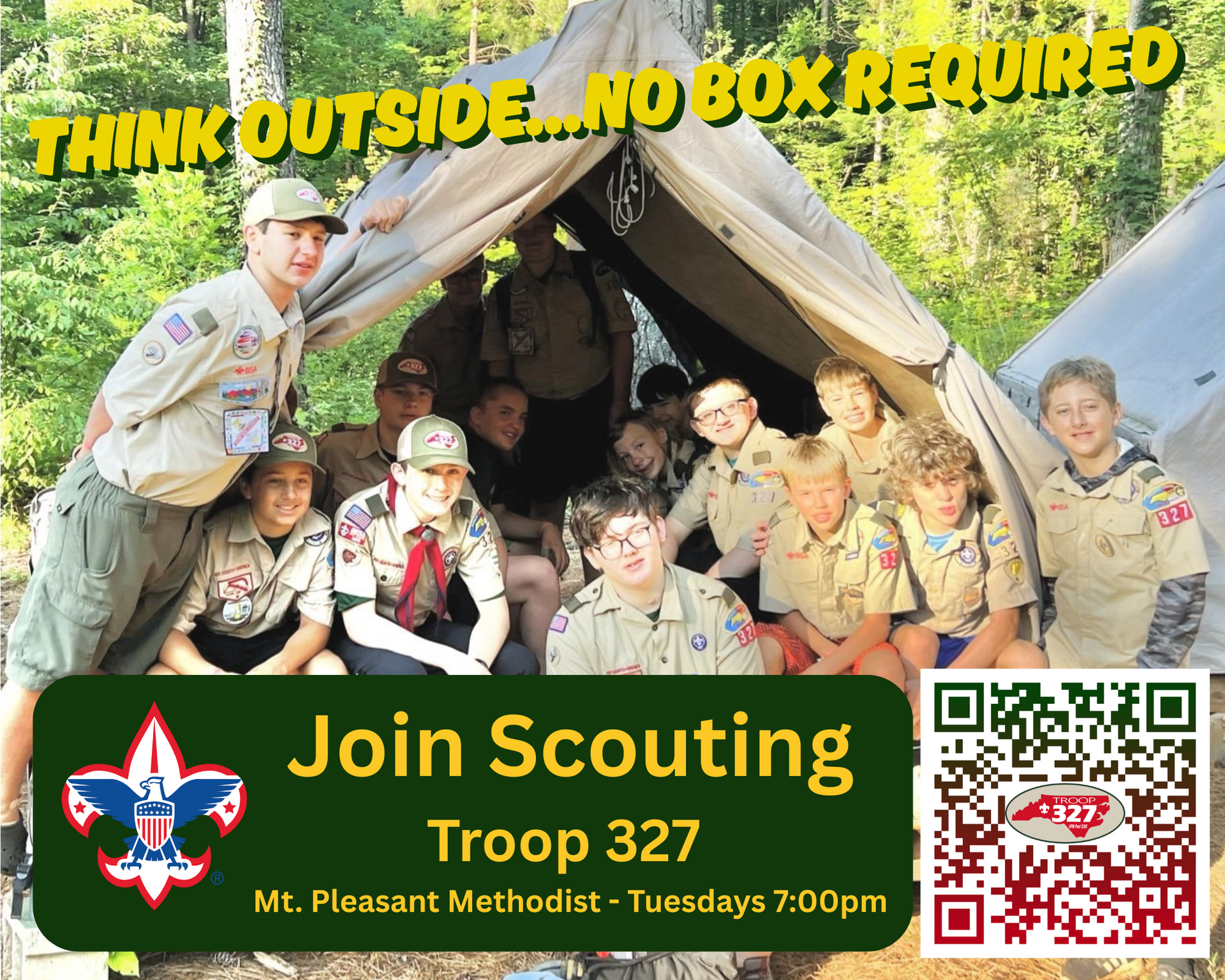 A group of boy scouts are posing for a picture in a tent