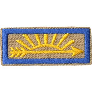 A patch with a sun and an arrow embroidered on it.
