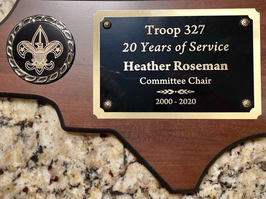 Plaque on wood-and-stone base reading “Troop 327 20 Years of Service Heather Roseman Committee Chair 2000–2020”