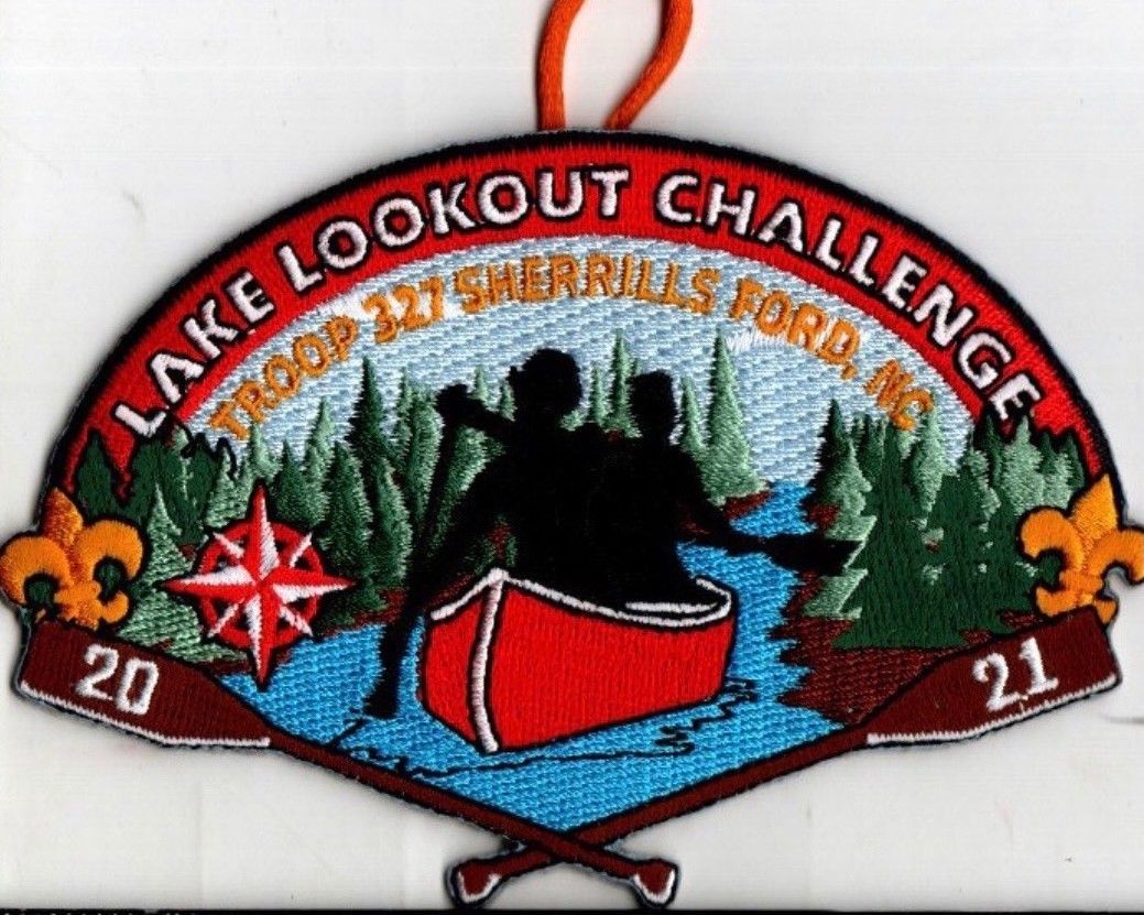 Lake Lookout Challenge 2021 patch with red canoe, trees, compass, and mountains