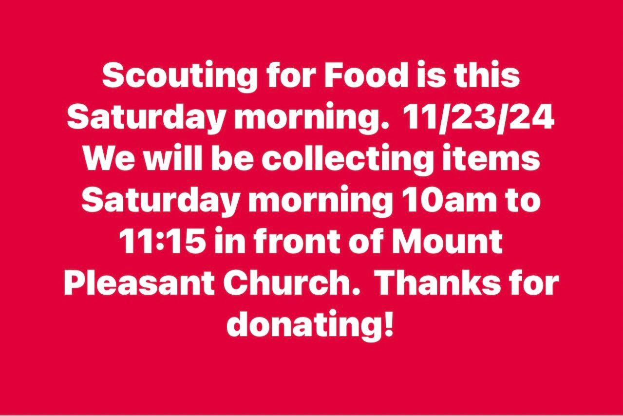 A red sign that says scouting for food is this saturday morning