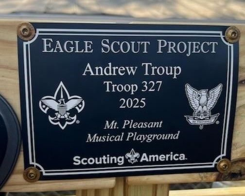 Blue Eagle Scout Project plaque for Andrew Troop 327 at Mt. Pleasant Musical Playground, 2025.