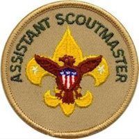 An assistant scoutmaster patch with an eagle and a fleur de lis.