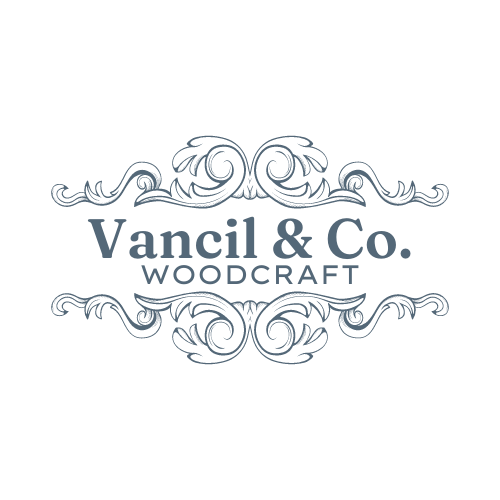 Logo for Vancil & Co. Woodcraft, featuring stylized ornate swirls around the company name in gray.