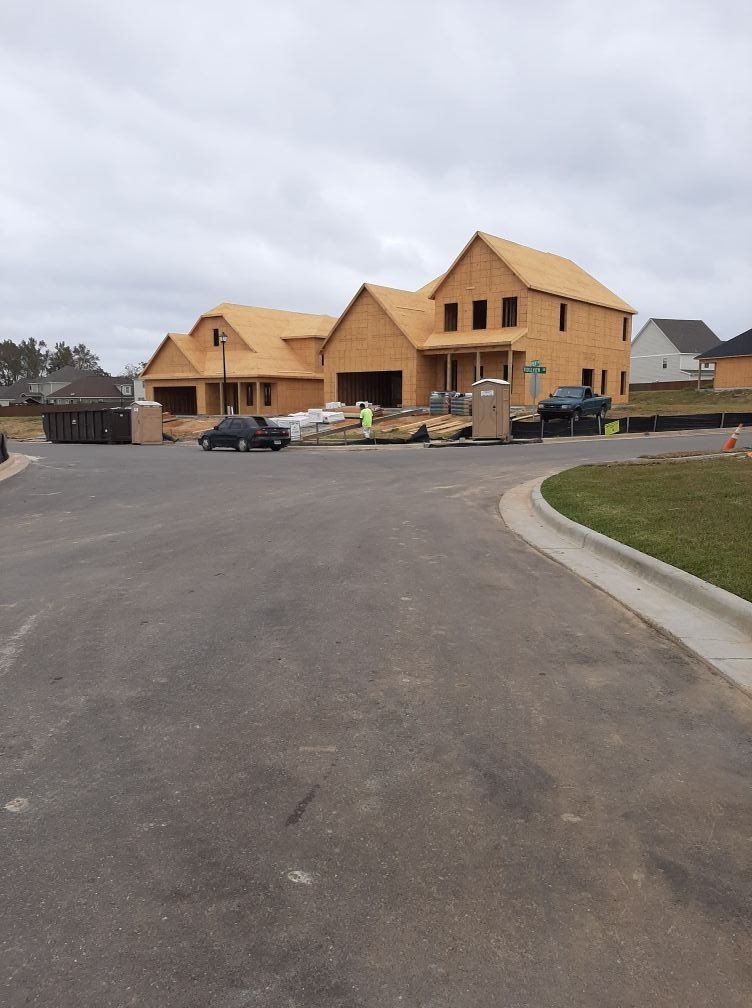 A large house is being built in a residential area