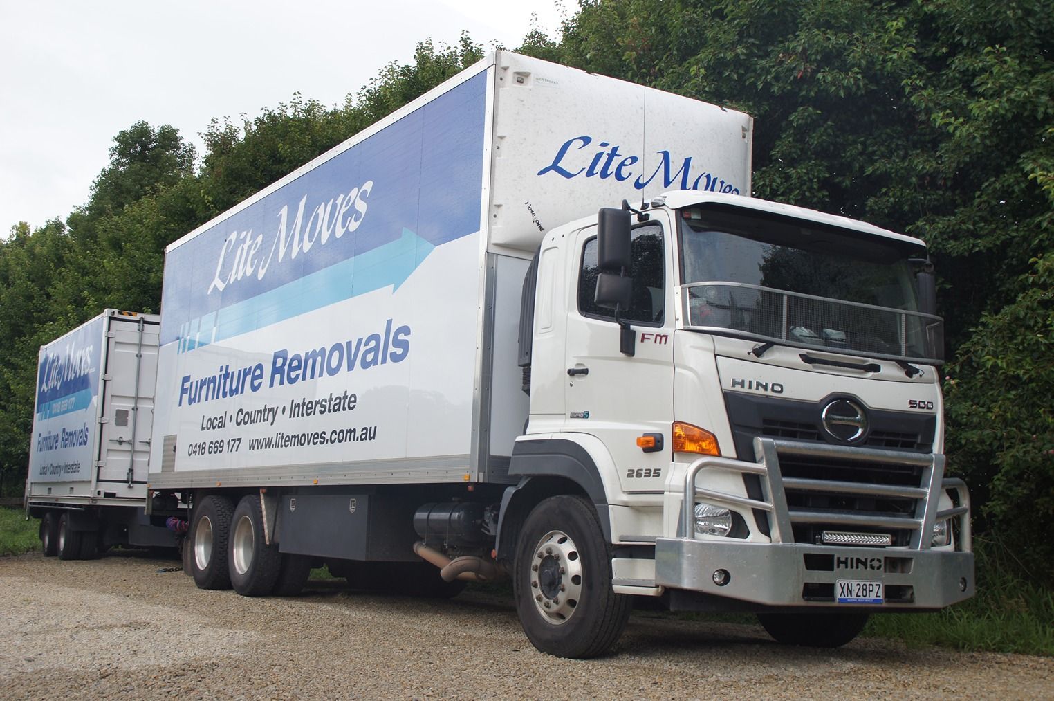A White Lite Moves Furniture Removal Truck With a Trailer — Lite Moves Furniture Removals In Sydney, NSW