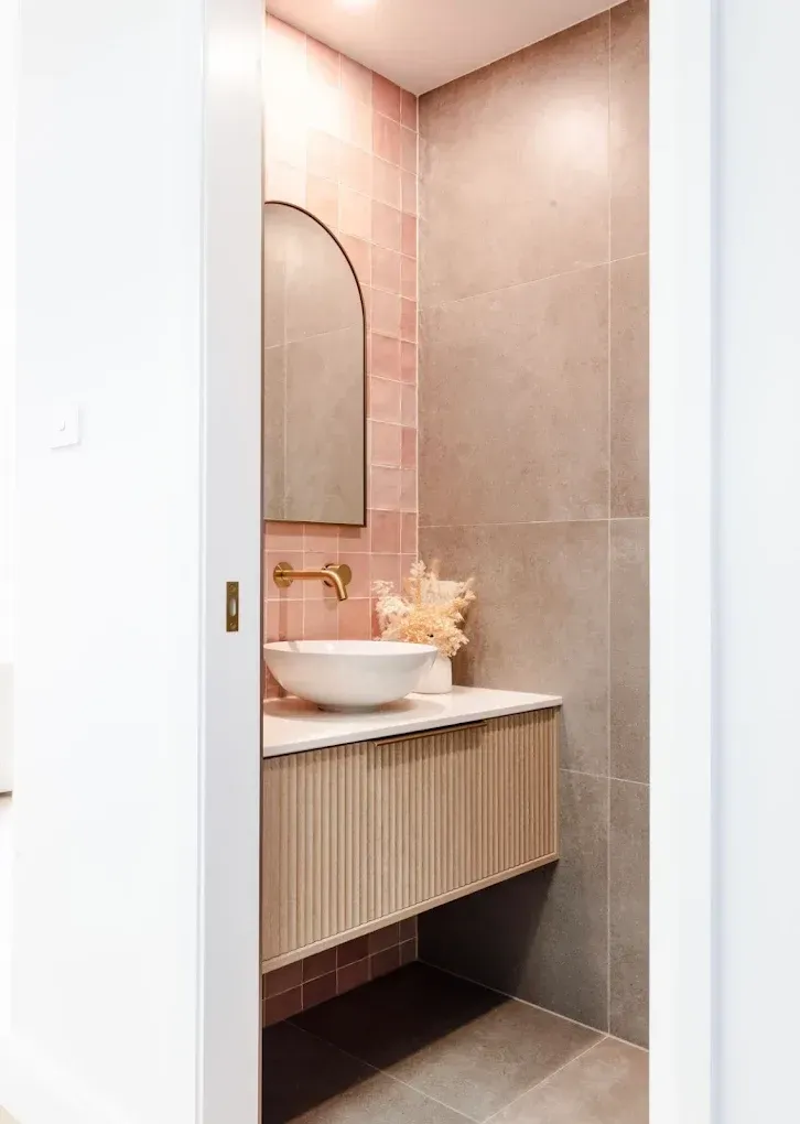 Small Bathroom With Pink Tiled Accent Wall — PK4 Projects in Port Macquarie, NSW