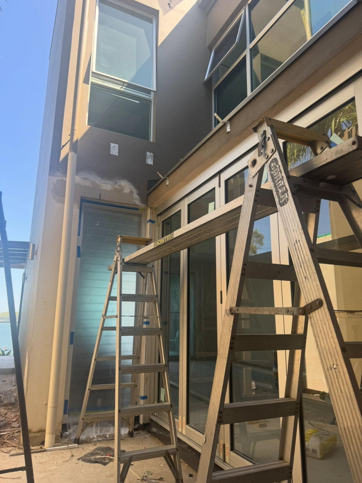 Ladders and Wooden Scaffolding in a Narrow Outdoor Alley  — PK4 Projects in Port Macquarie, NSW