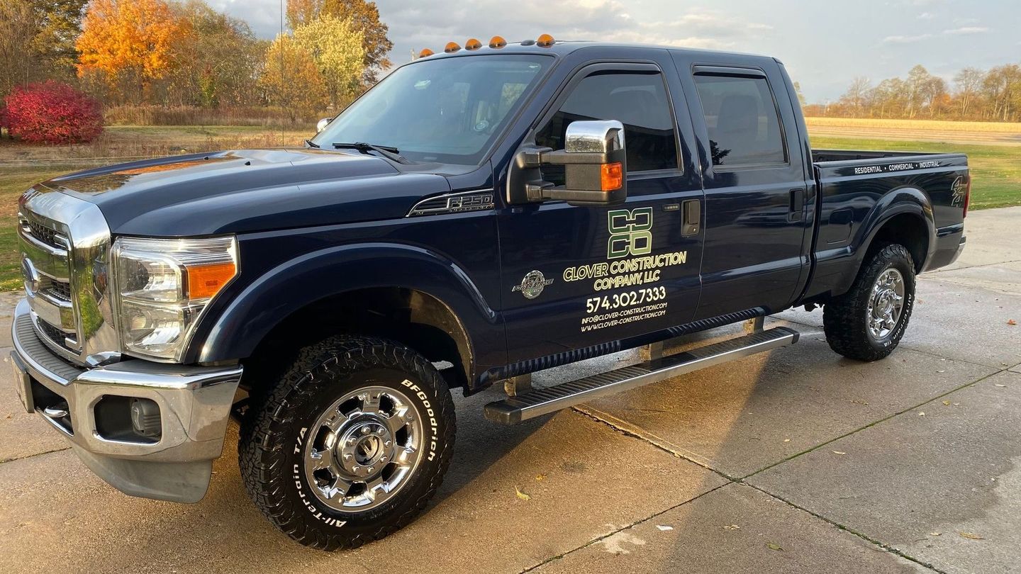 Clover Construction Company LLC blue company truck