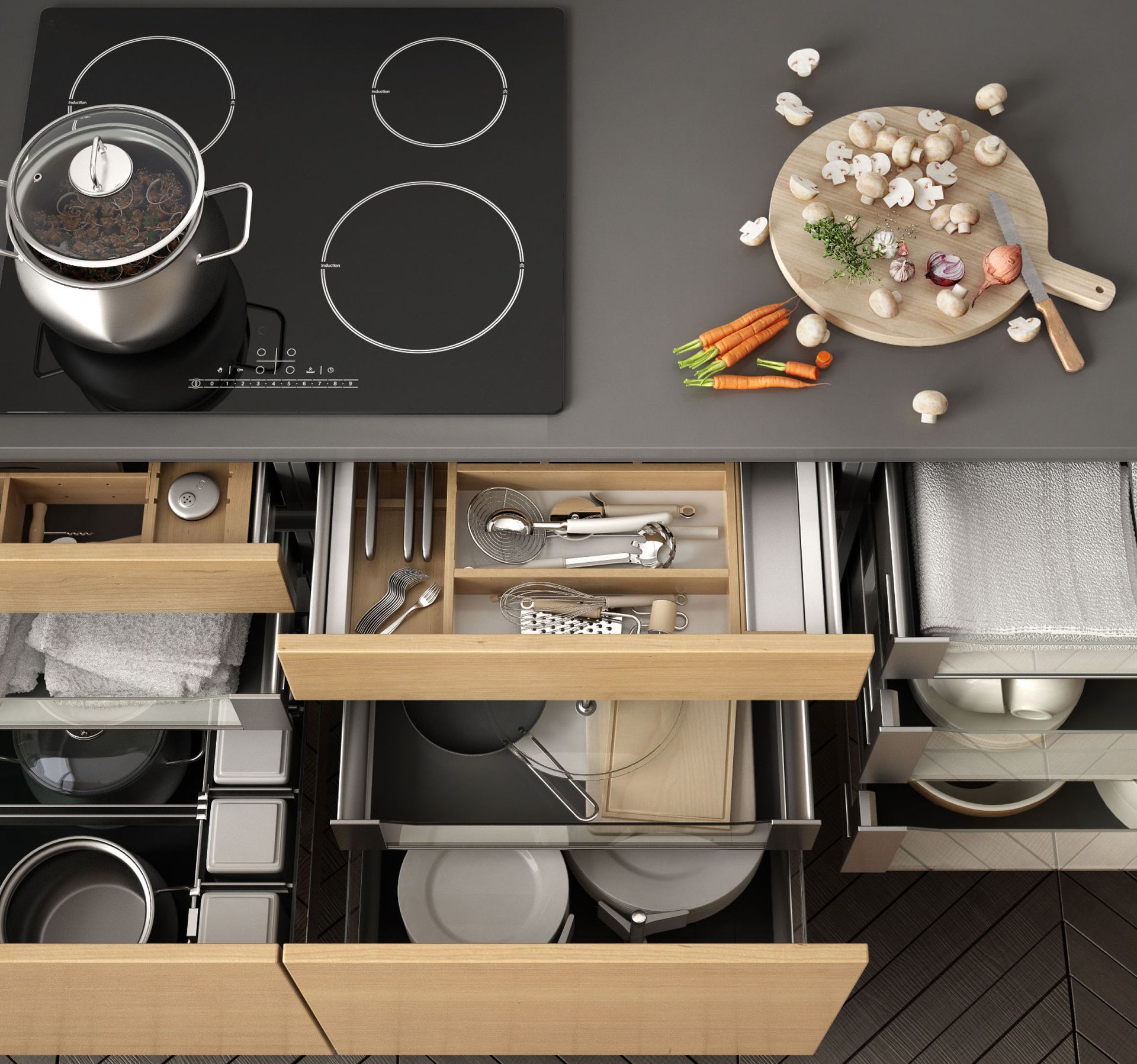 Open kitchen drawers showing organized cookware beside a stovetop and cutting board with vegetables.