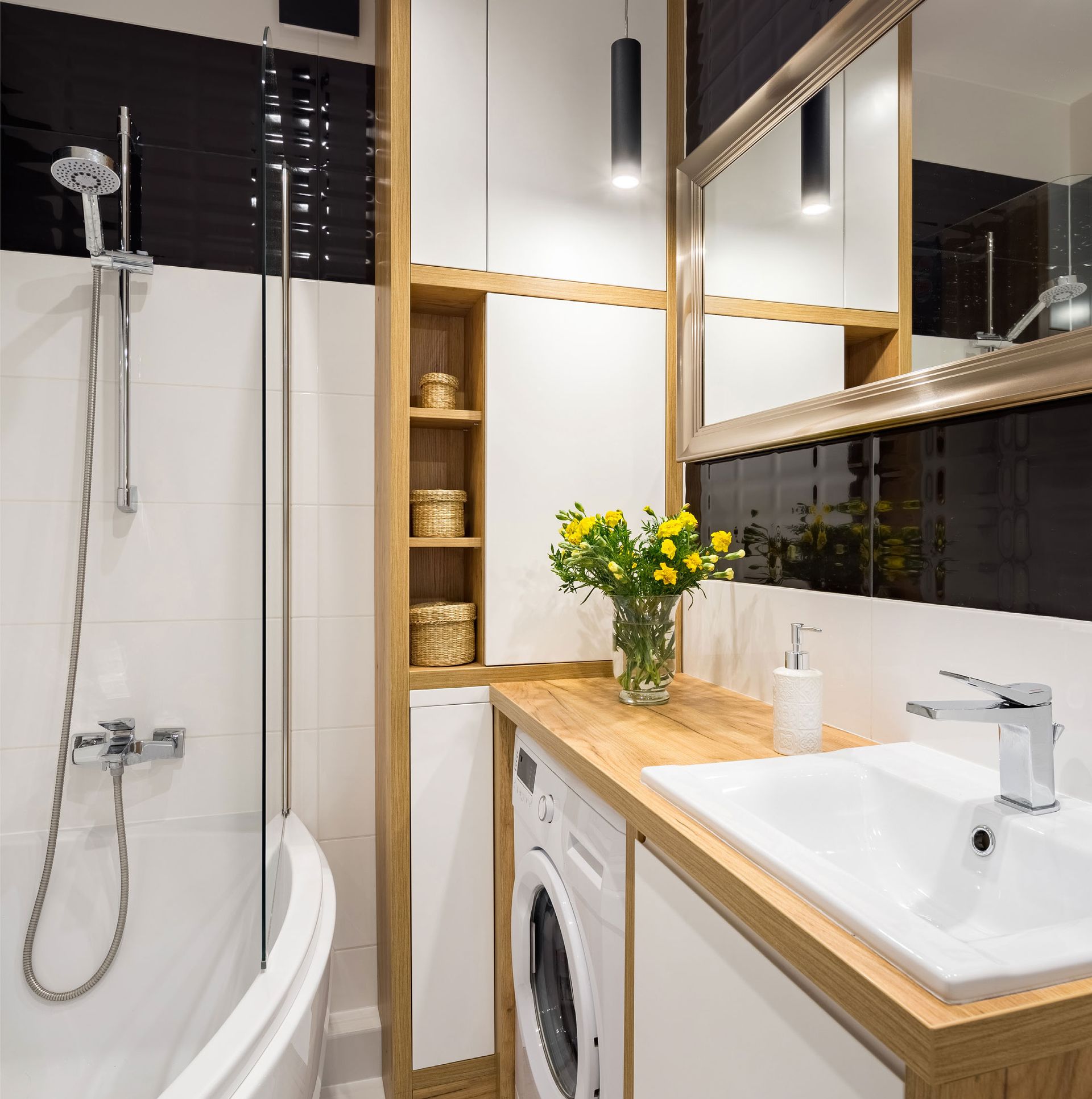 Modern bathroom with shower, bathtub, sink, and wooden vanity with mirror