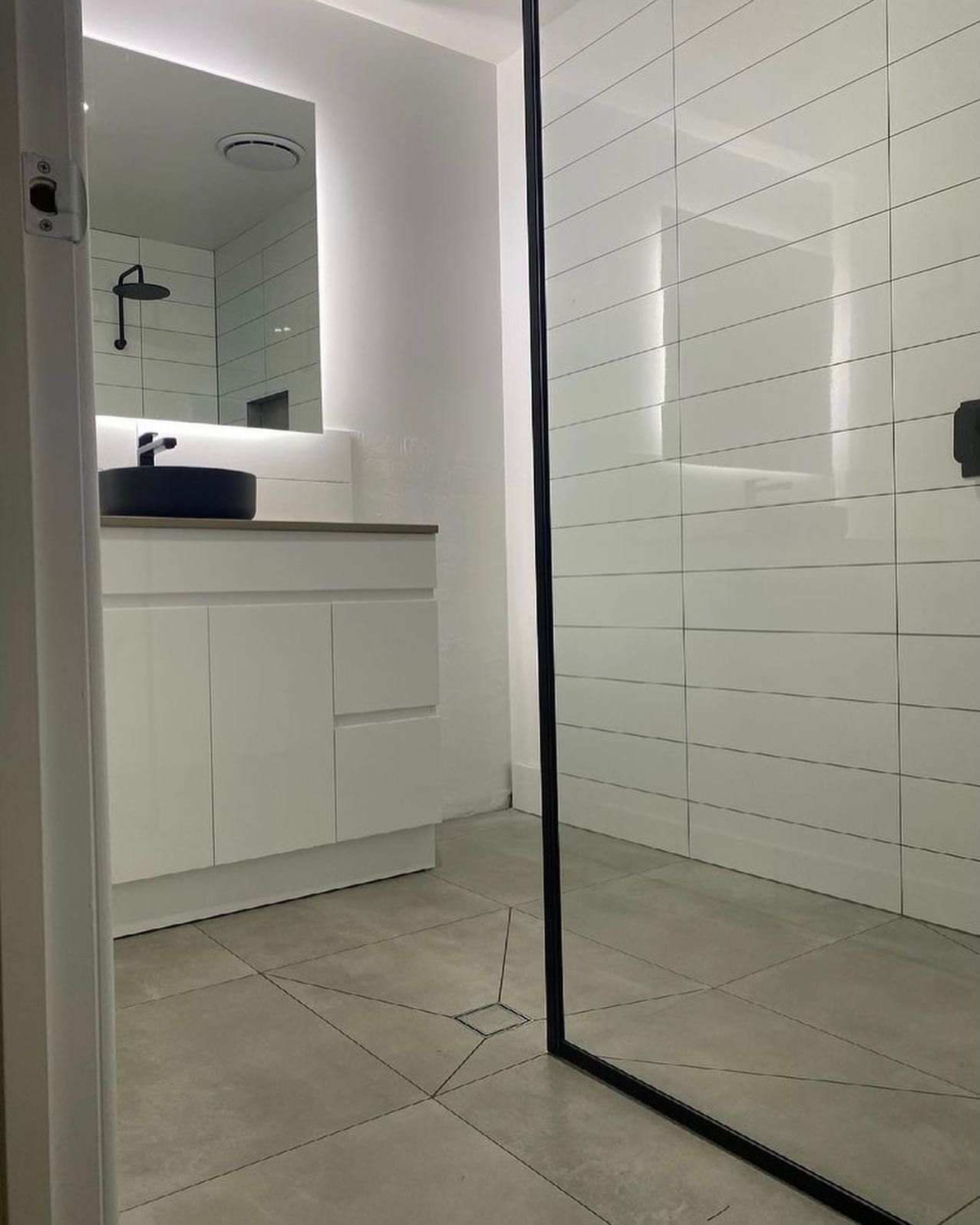 A Black Sink Is Sitting In A Renovated Bathroom — Sampson Plumbing Pty Ltd In Casuarina, NSW