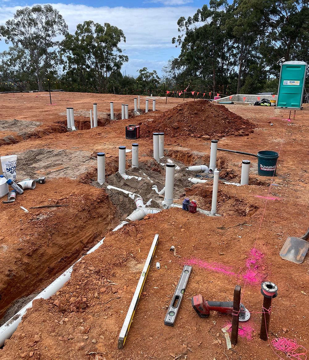 Construction Site With Plumbing Pipes In Trenches — Sampson Plumbing Pty Ltd In Casuarina, NSW