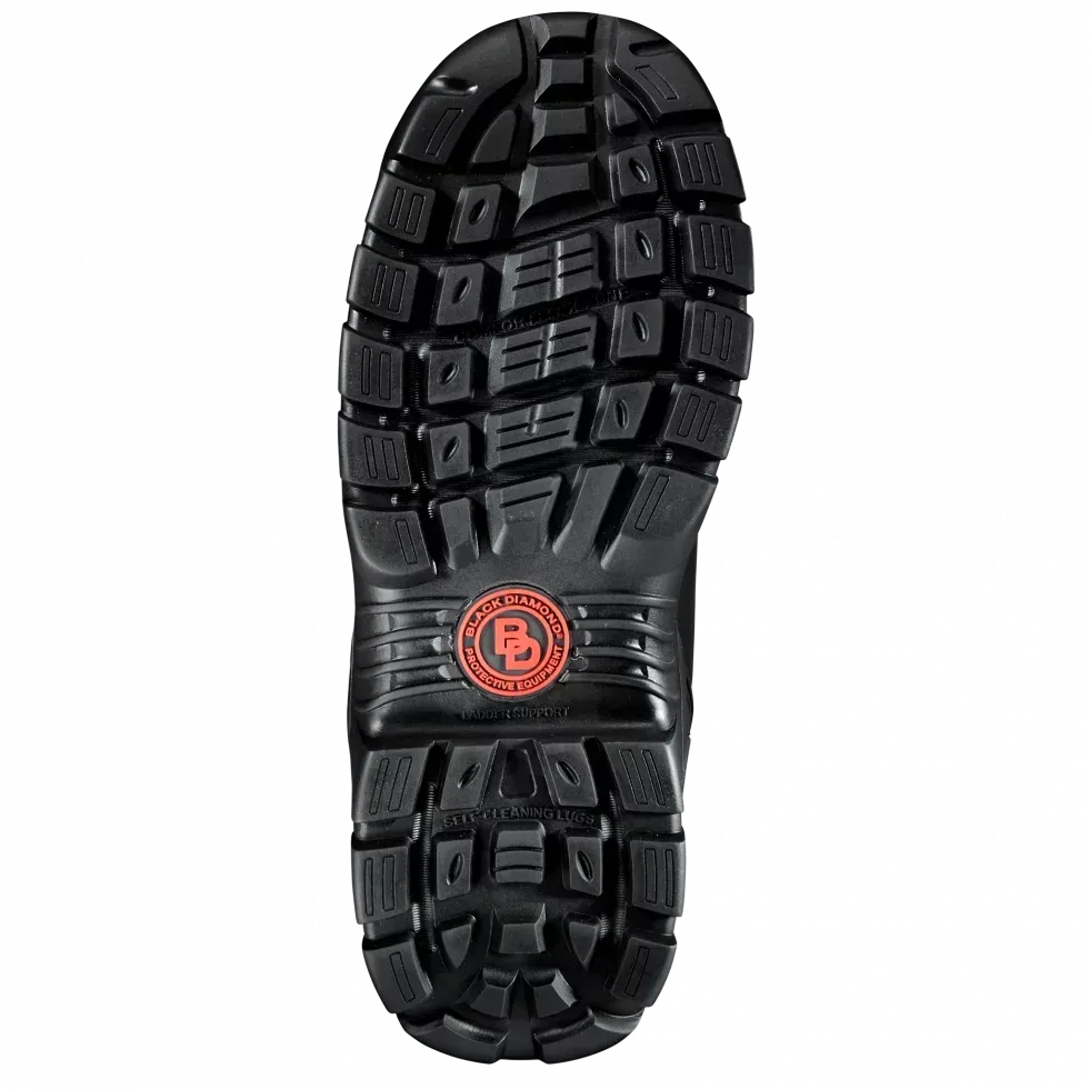 A close up of the bottom of a black boot on a white background.
