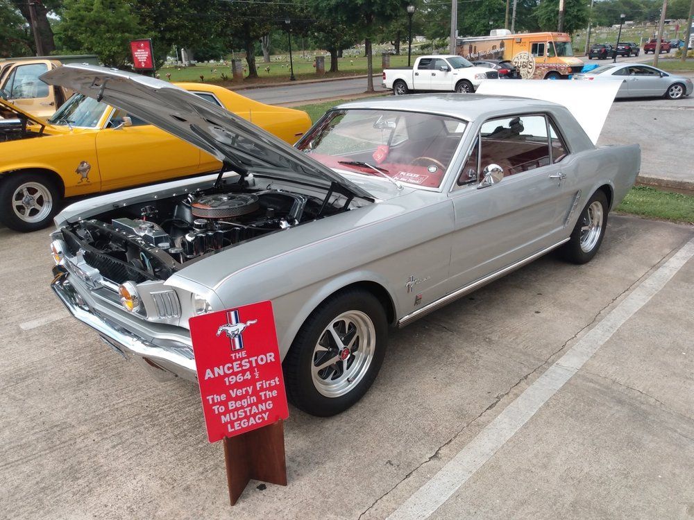 Silver 1965 Ford Mustang with Hood Up | Peak Customs and Collision Inc