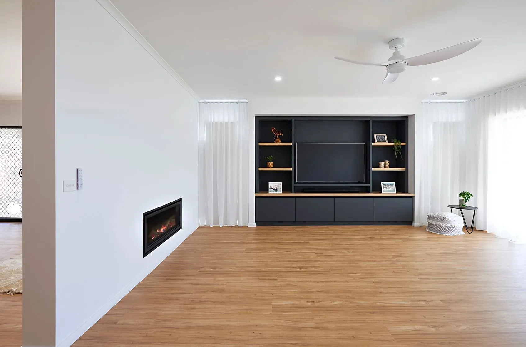 Furnished Family Room with a New Custom-Built TV Unit — Shepparton Vic — Kitchenwise Furnished Family Room with a New Custom-Built TV Unit — Shepparton Vic — Kitchenwise