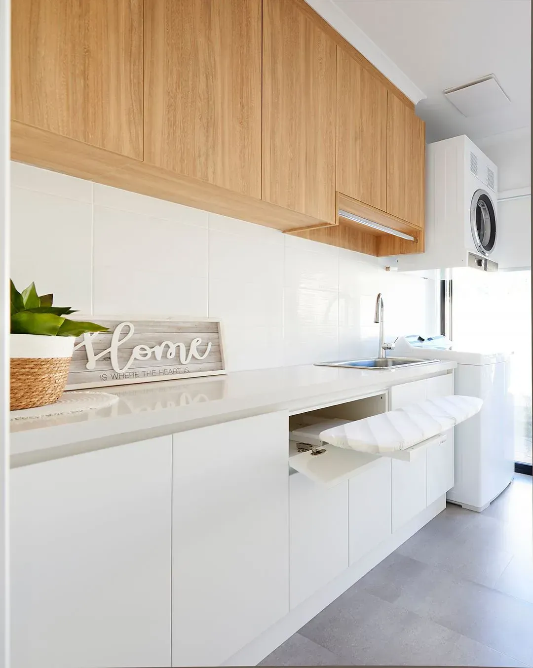 Laundry’s Floor and Bench Space Is Optimised with Space-Saving Hardware — Shepparton Vic — Kitchenwise Laundry’s Floor and Bench Space Is Optimised with Space-Saving Hardware — Shepparton Vic — Kitchenwise