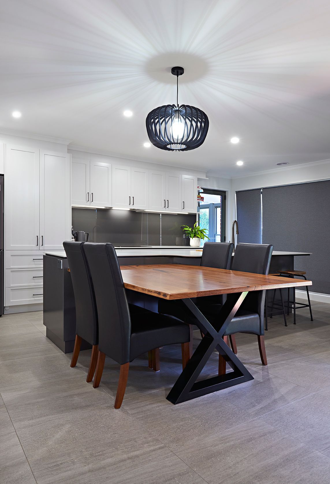 island kitchen with perpendicular table