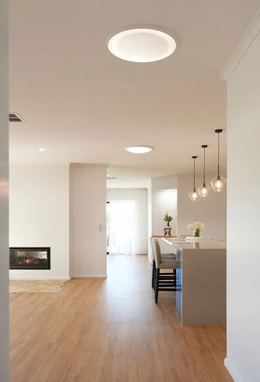 A Stone Waterfall Island Features in the New Open-Plan Kitchen/dining/living Space — Shepparton Vic — Kitchenwise A Stone Waterfall Island Features in the New Open-Plan Kitchen/dining/living Space — Shepparton Vic — Kitchenwise