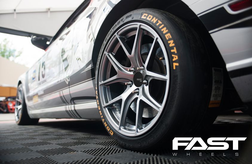 A close up of a continental tire on a car