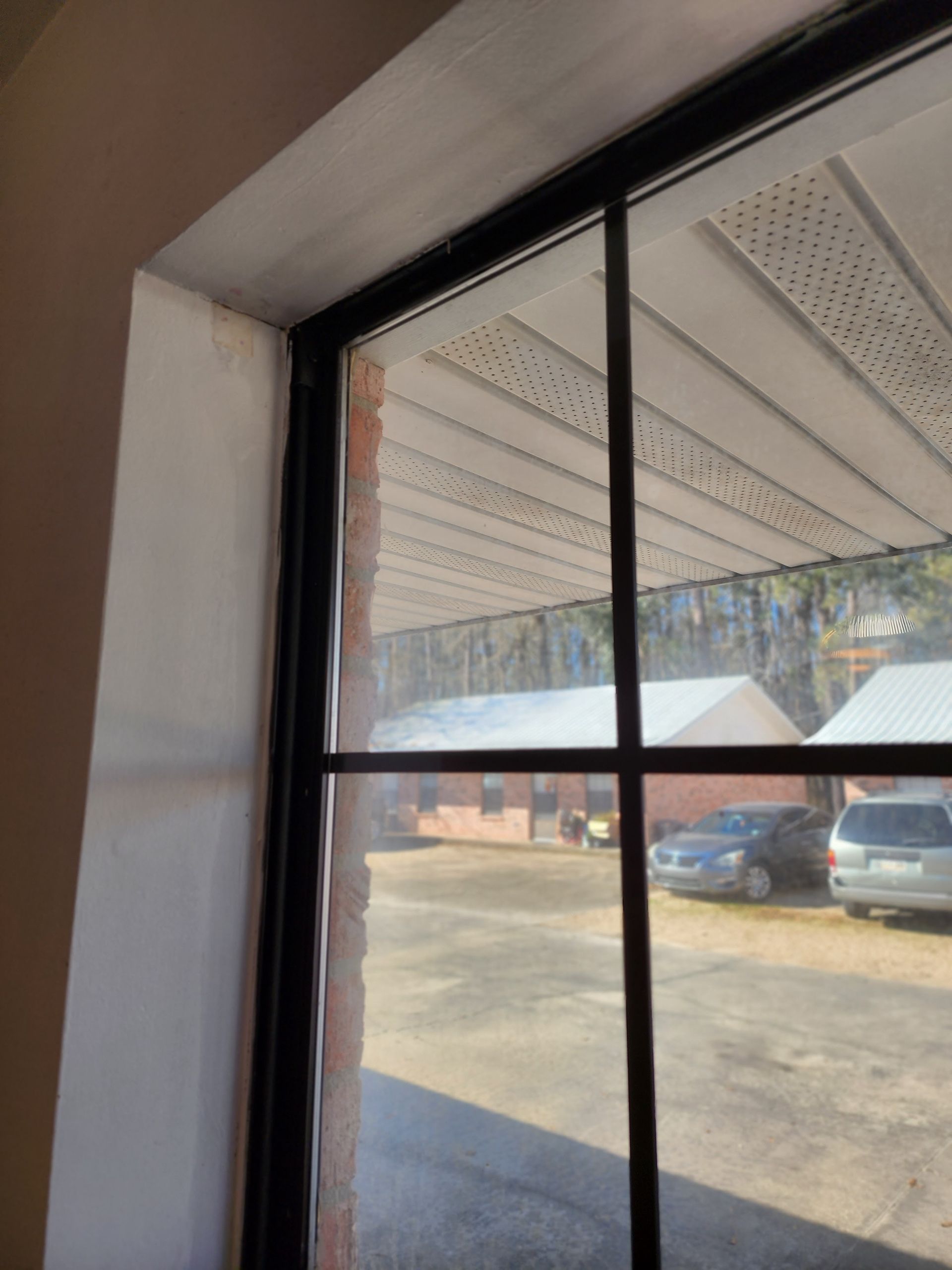 A view of a parking lot through a window