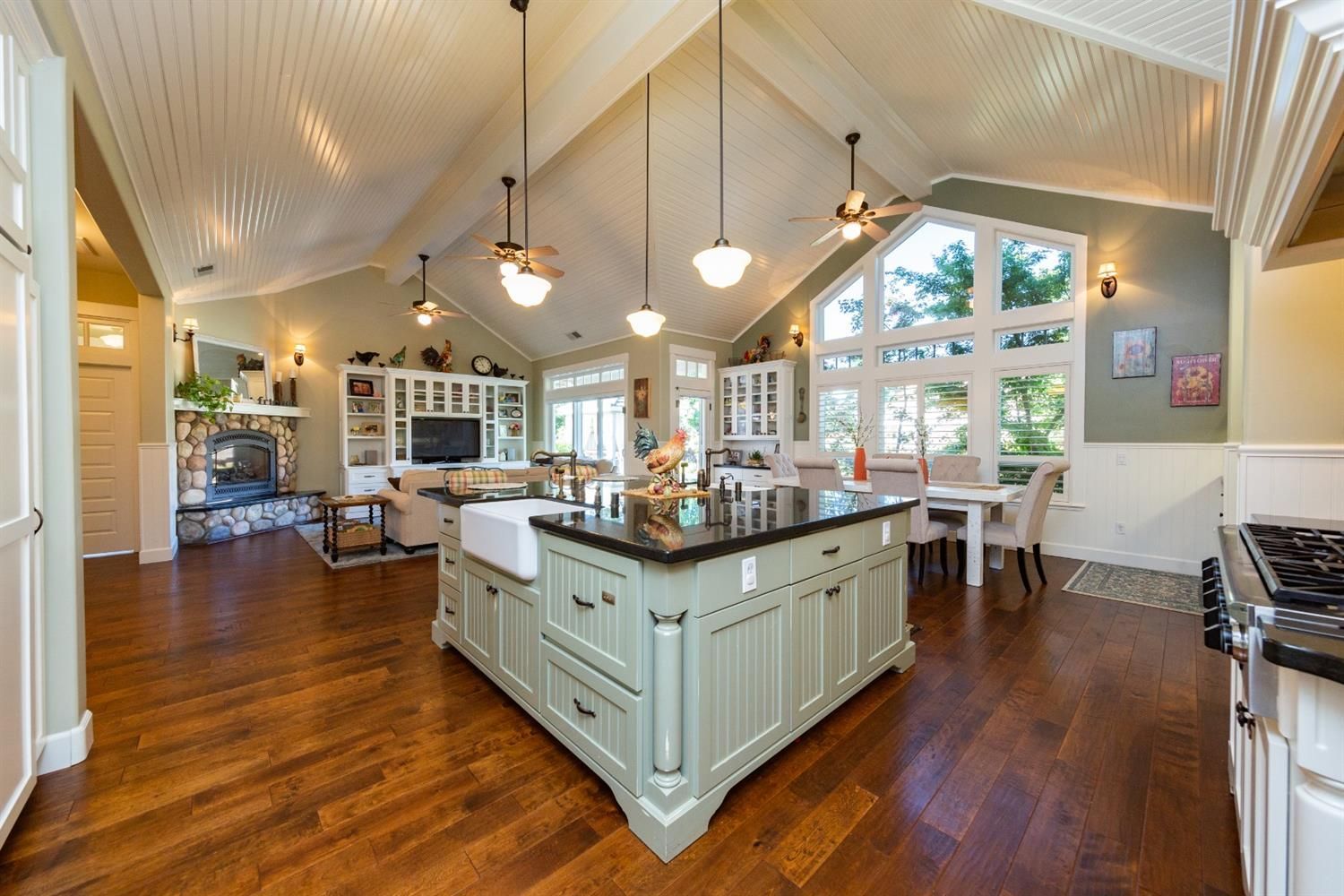 There is a large island in the middle of the kitchen.