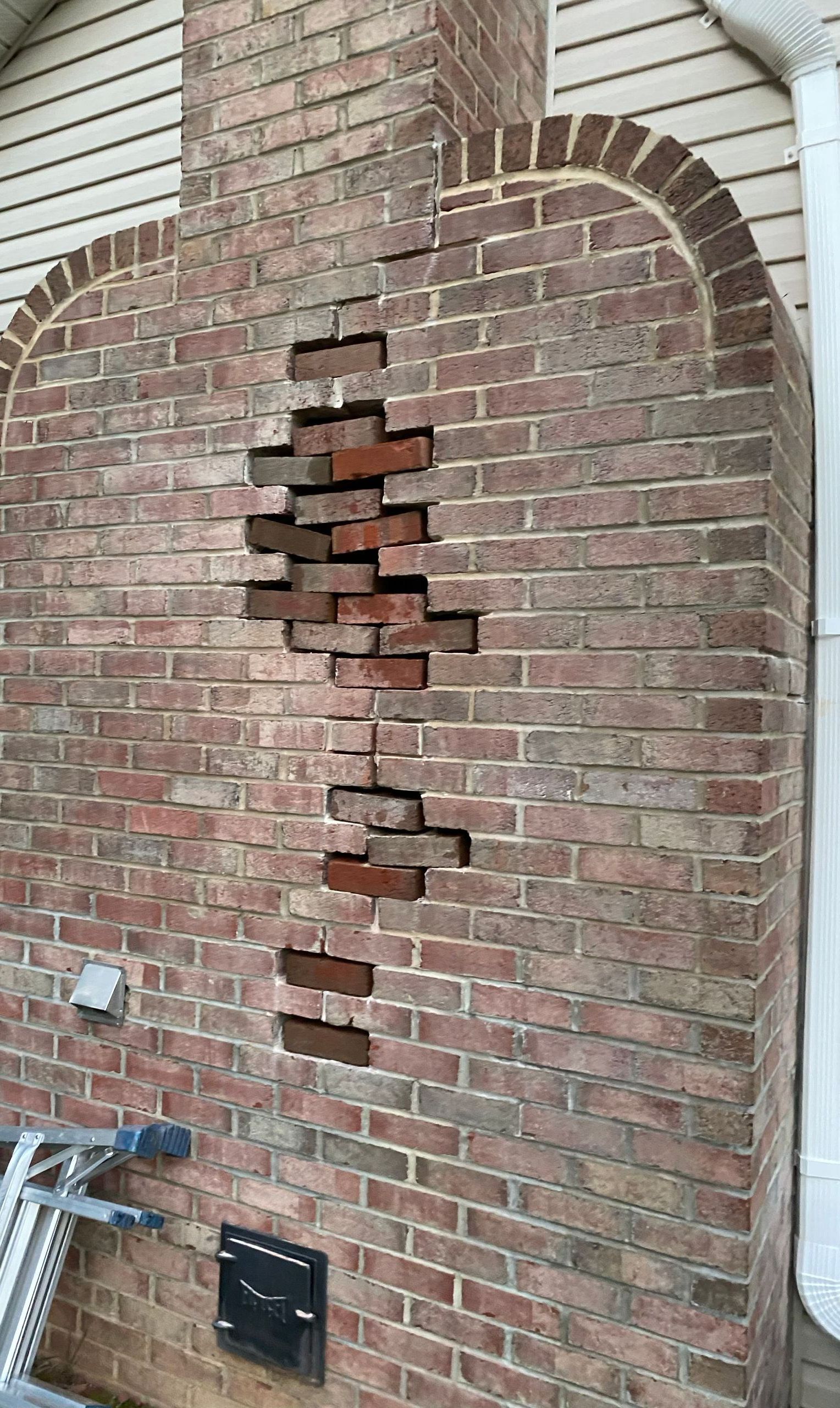 brick chimney needing repair