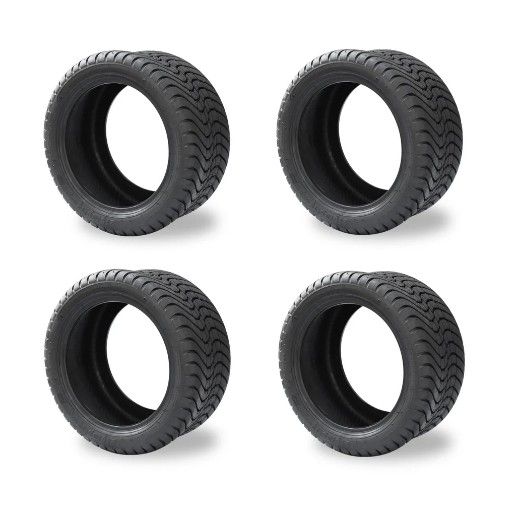 Four Black Tires With Tread Patterns Arranged In A Square — Buggies & Batteries in Hidden Valley, QLD