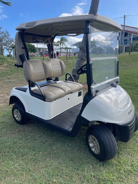 White Golf Cart on Grass With Beige Seats and Canopy — Buggies & Batteries in Hidden Valley, QLD