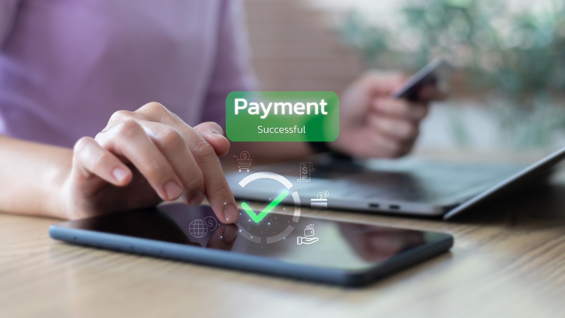Hand using a smartphone to pay online, tapping the 