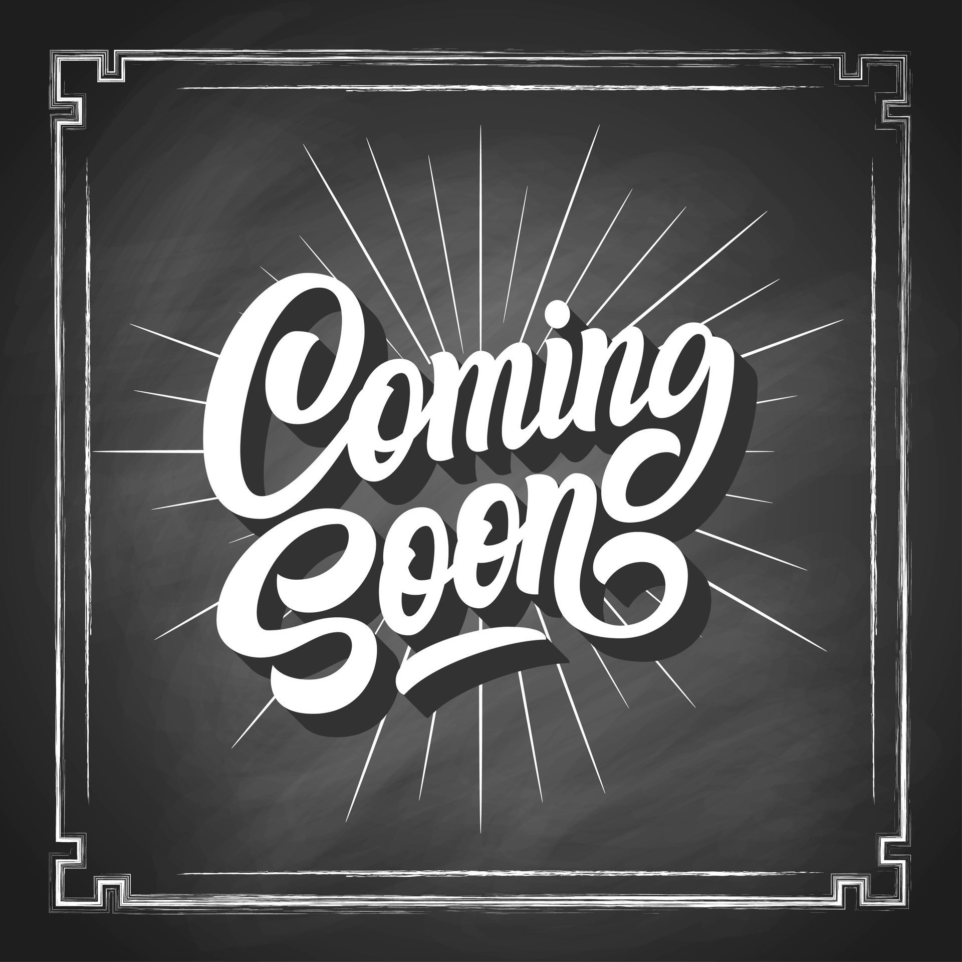 A blackboard with the words coming soon written on it