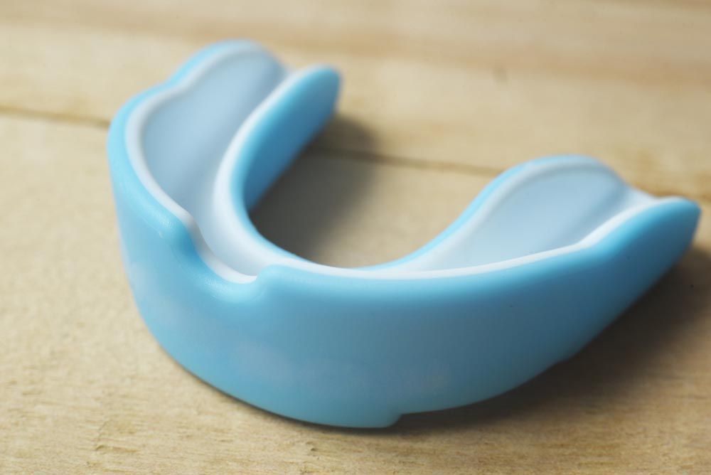 Light Blue Mouthguard — The Denture Care Group Sunshine Coast in Caloundra, QLD