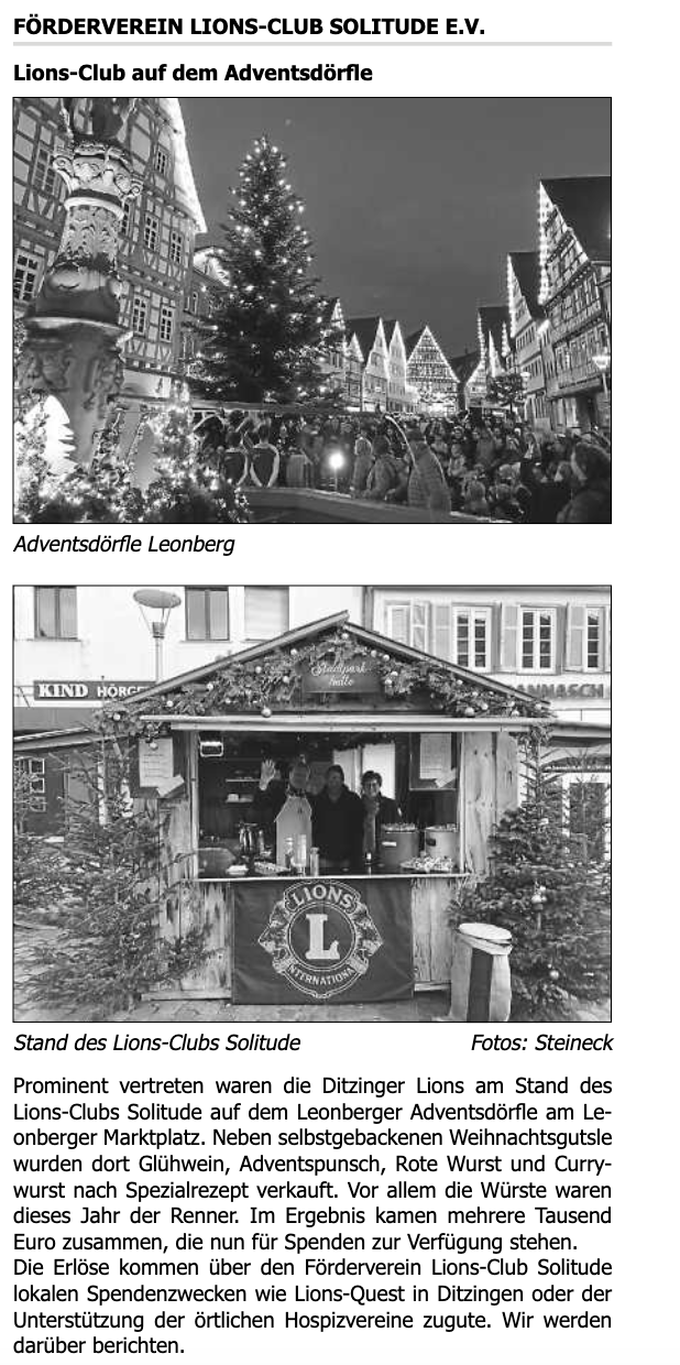Ein Schwarzweißfoto eines Lions Clubs und eines Gebäudes.