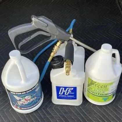 Three bottles of cleaners including one that says hf on it