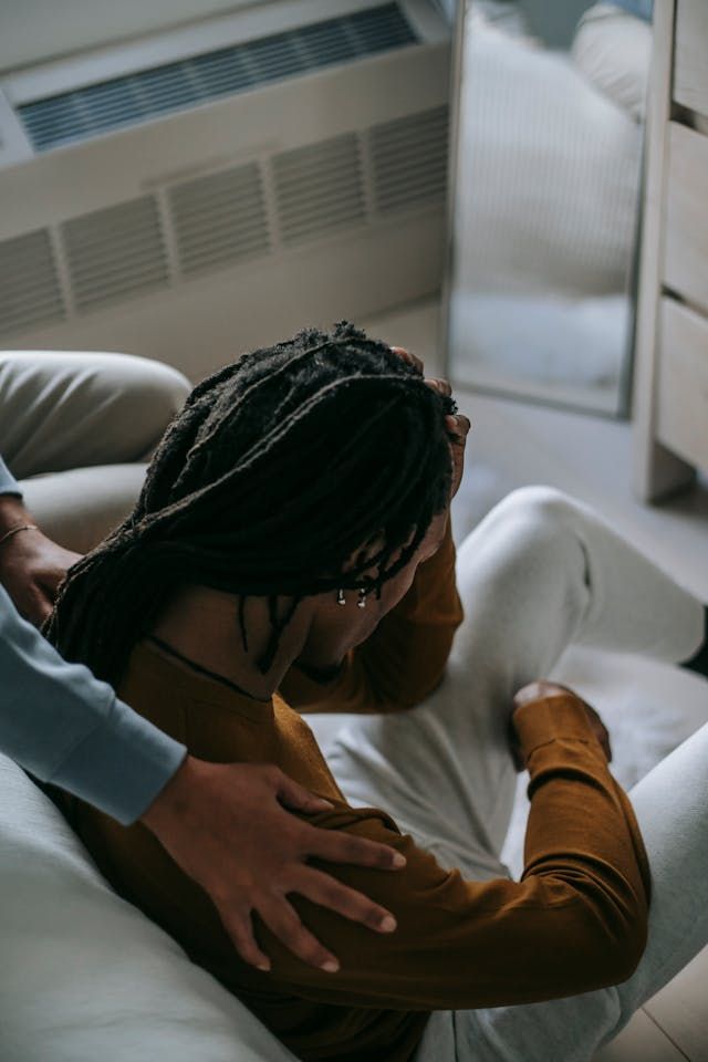 a person grieving from a loss of a loved one
