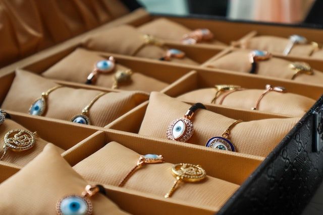 Memorial jewelry display featuring keepsakes for cremation services in Lewiston ME.