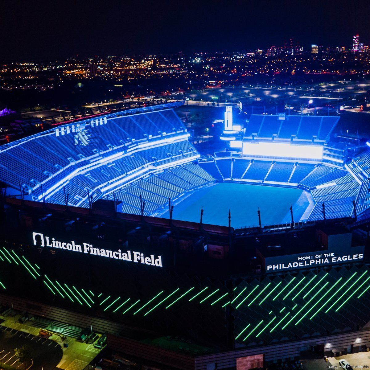An aerial view of lincoln financial field lit up at night