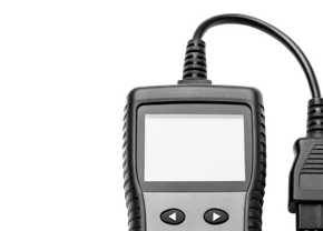 OBD2 code reader with blank screen, connected by a cable, isolated on white background. | Big n' Littles Auto Body