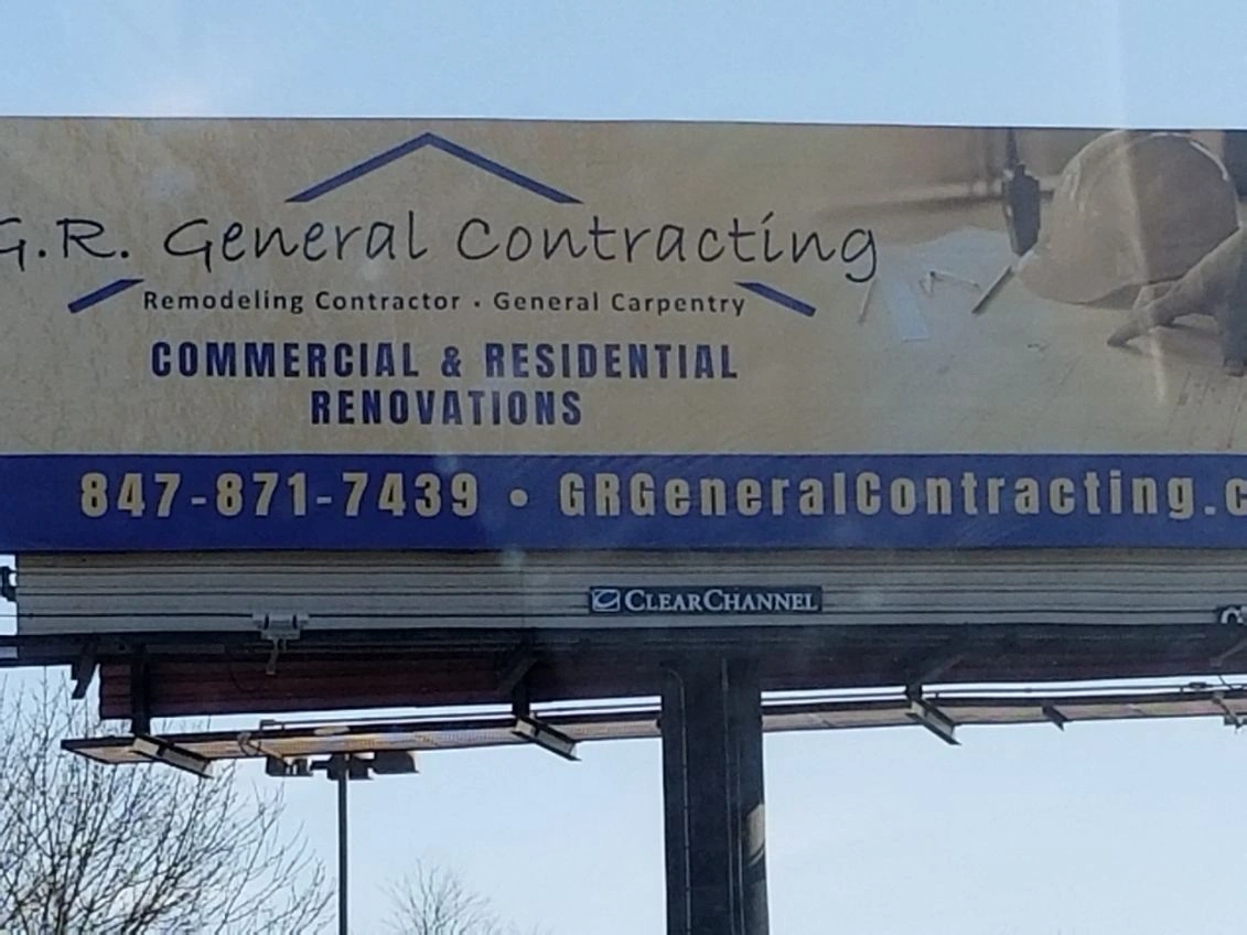 Billboard for R.R. General Contracting, a blue and beige commercial and residential remodeling ad.