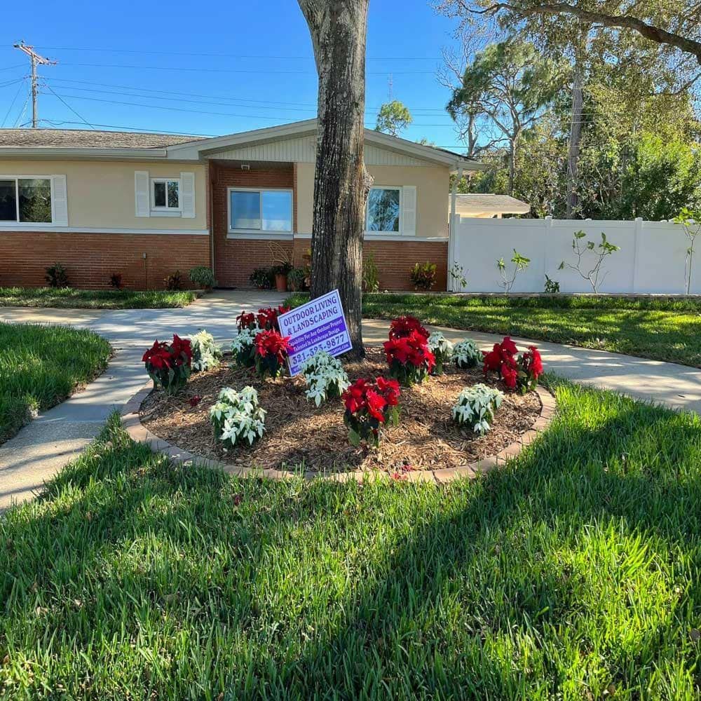 A house with foliage in front of it.