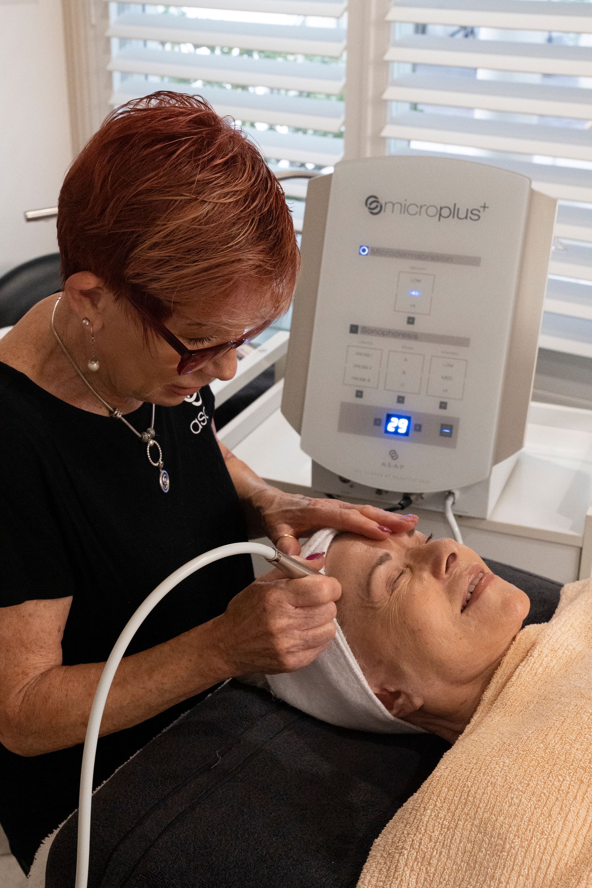 Woman Receiving a Facial Treatment with A Machine — Beauty In Profile In Salamander Bay, NSW