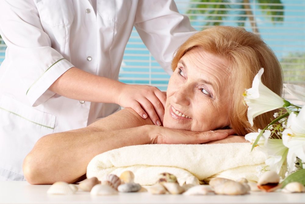 Woman Receiving a Shoulder Massage at A Spa — Beauty In Profile In Salamander Bay, NSW