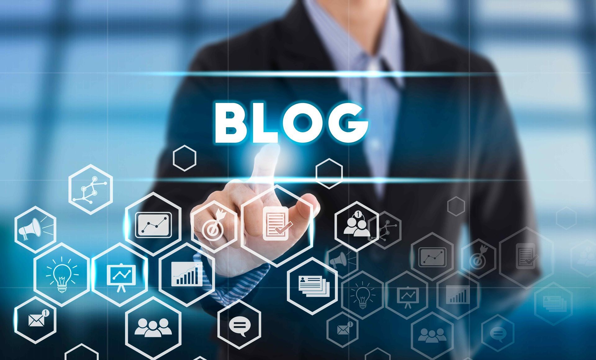 A man in a suit is pressing a button on a screen that says blog.
