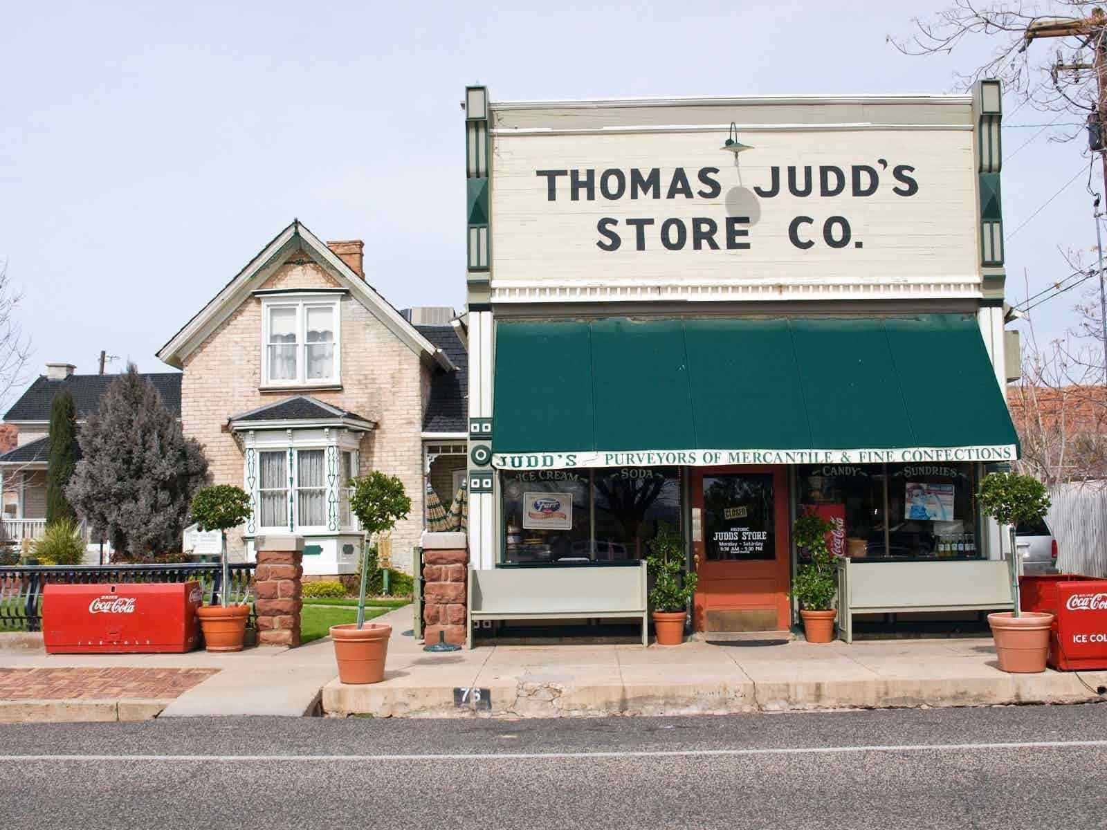 A store in St. George Ut called thomas judd 's store co. has a green awning