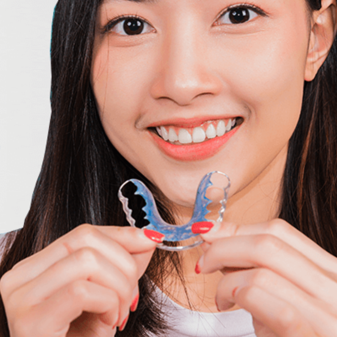 Clear inman aligner brace outside of patients mouth