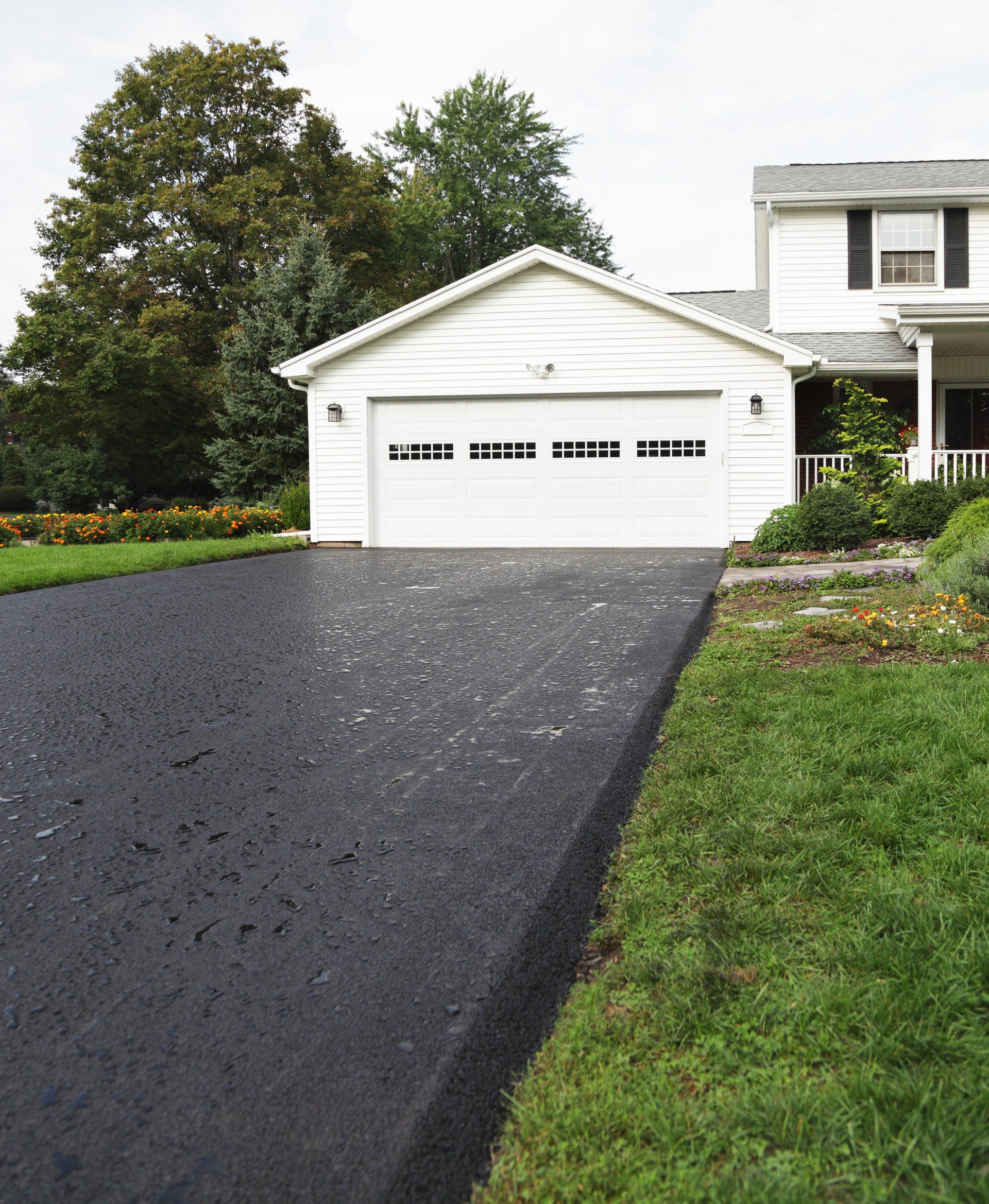 Concrete pouring on driveway — Plainfield, IL — Power Paving Concrete pouring on driveway — Plainfield, IL — Power Paving