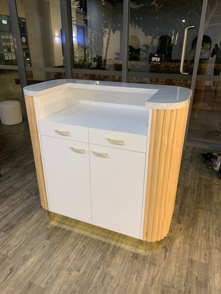 White Sink Cabinet with Gold Handles and Warm Side Lighting — JPR Concepts in Burleigh Heads, QLD