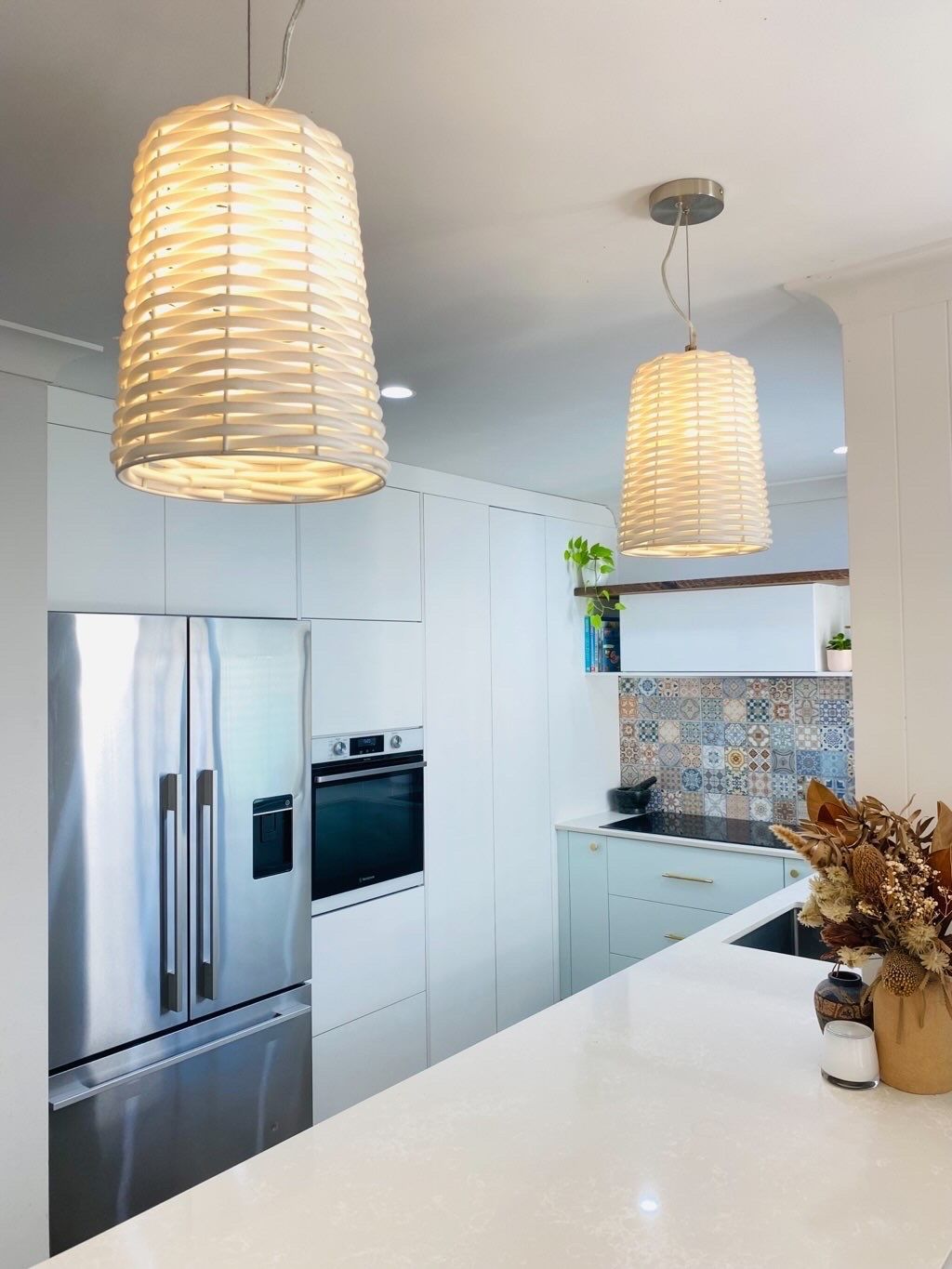 Bright Modern Kitchen with White Cabinets — JPR Concepts in Burleigh Heads, QLD